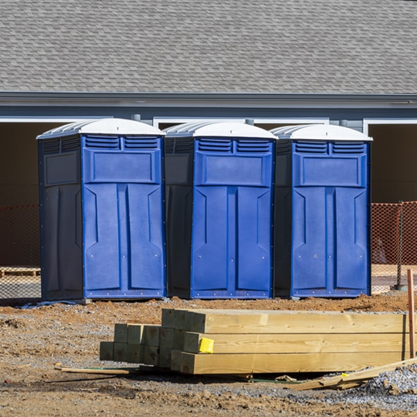 what is the cost difference between standard and deluxe portable toilet rentals in Ancramdale